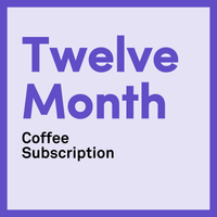 twelve month coffee subscription inside a white box against a purple background