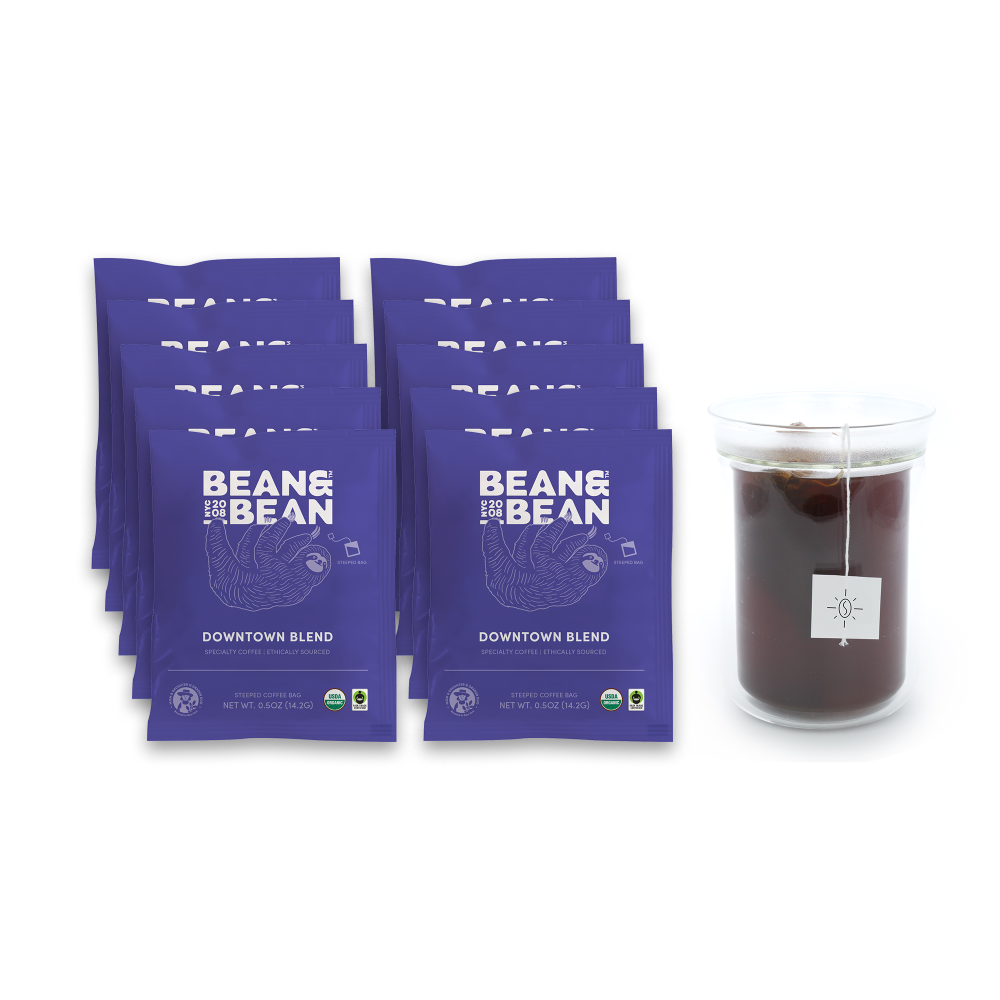 Stack of Bean & Bean Steeped Coffee Bag Packs beside a cup of coffee