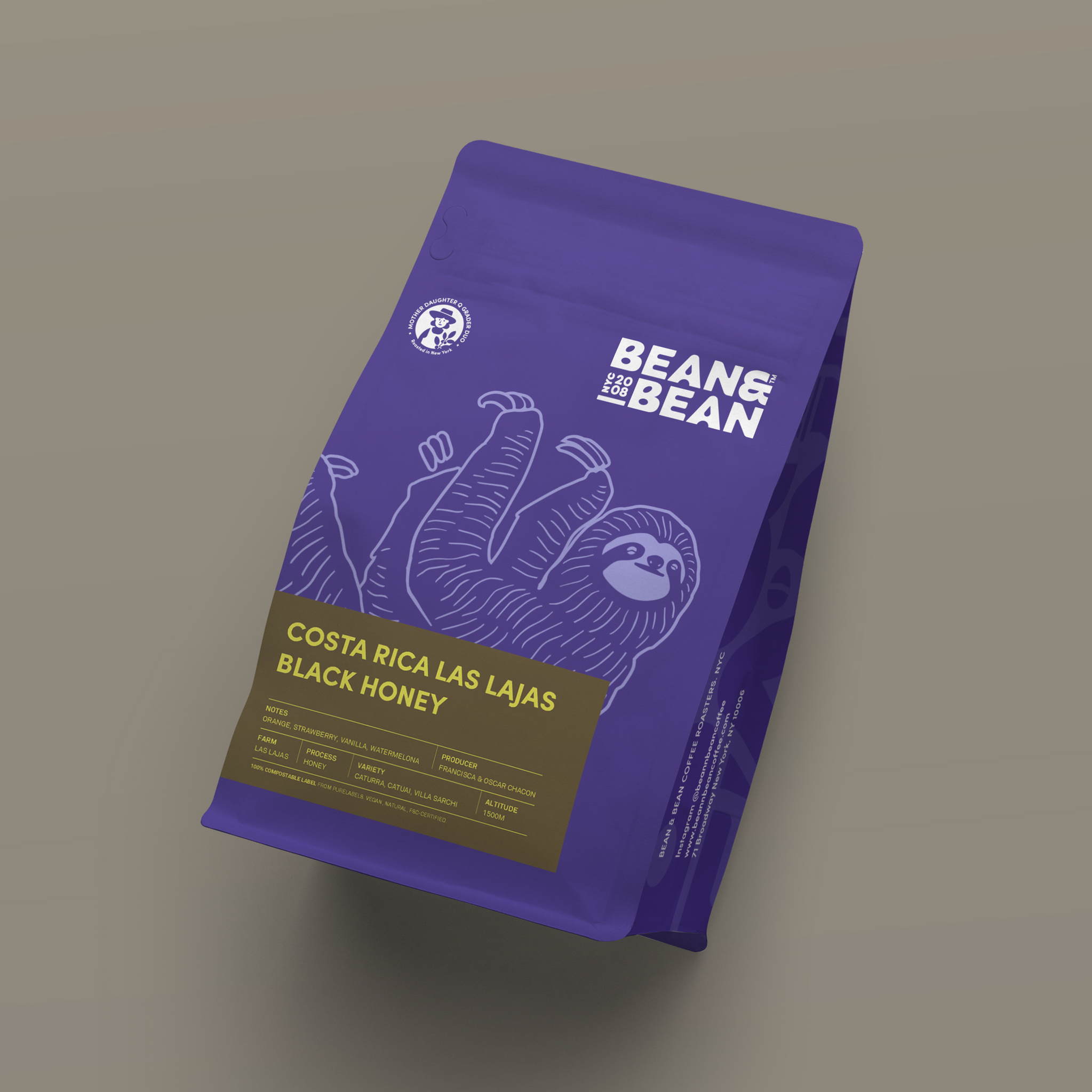 Purple "Bean & Bean Coffee Roasters" bag with a brown label that says "Costa Rica Las Lajas Black Honey"