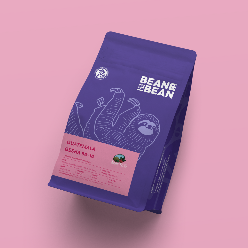 Purple "Bean & Bean Coffee Roasters" bag with a pink label that says "Guatemala Gesha 98-18"