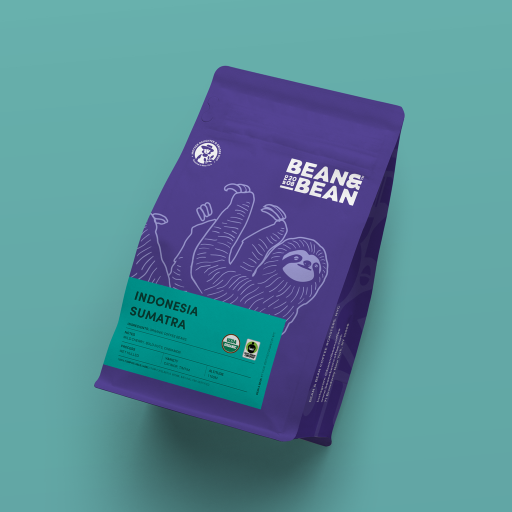 Purple "Bean & Bean Coffee Roasters" bag with a turquoise label that says "Indonesia Sumatra"